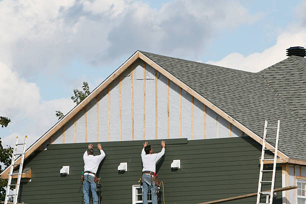 Professional Siding technician working in Franktown, CO